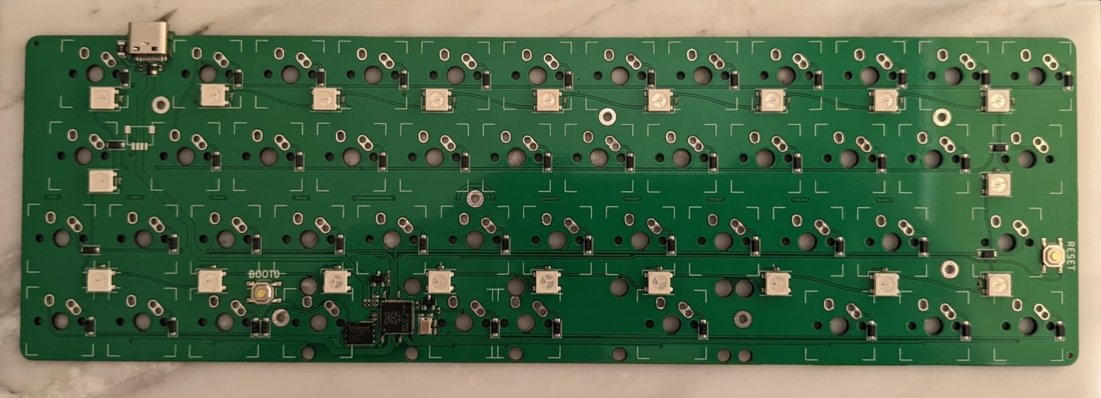 Back of a pre-production Coffeevan PCB showing the twenty RGB underglow LEDs