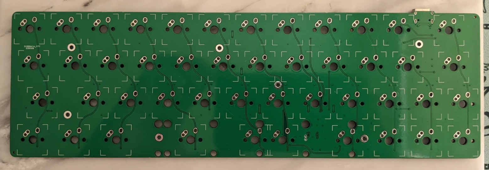 Front of a pre-production Coffeevan PCB with green solder mask