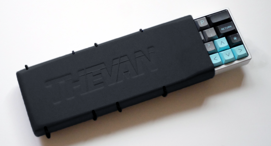 Black Holster on a MiniVan with DSA LightCycle keycaps