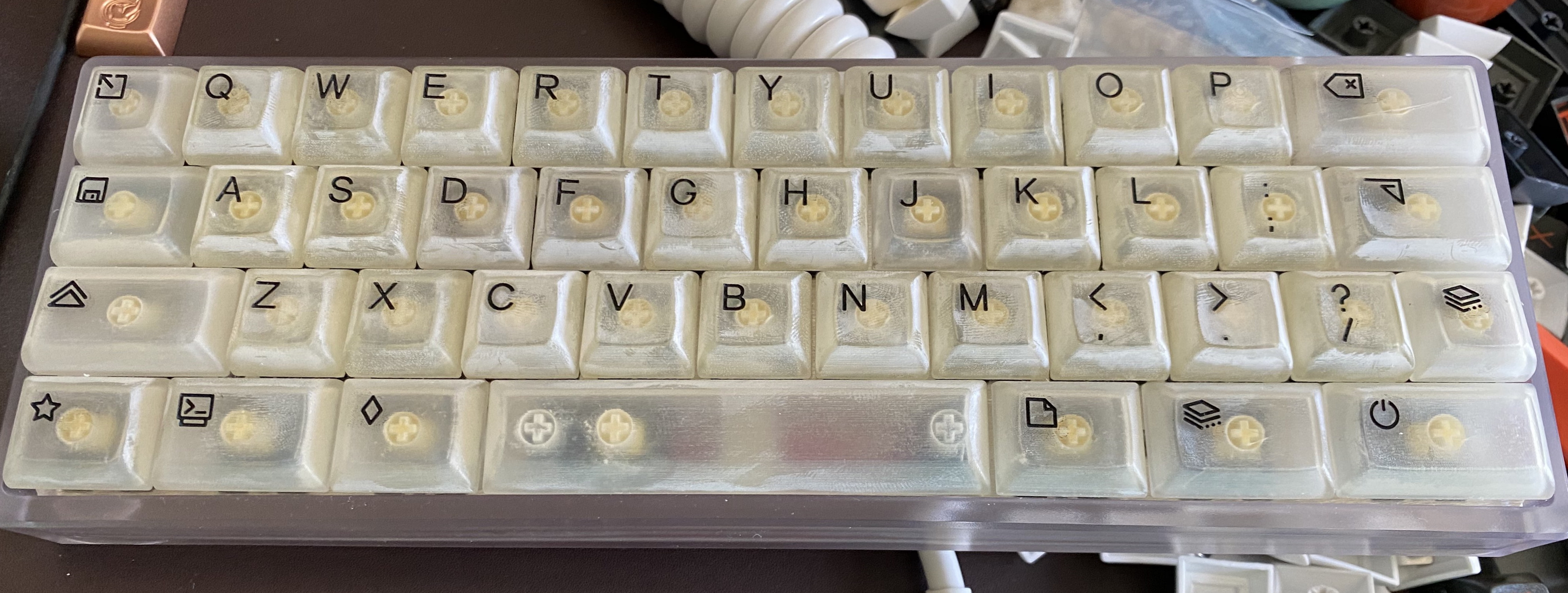 Prototype HuB keycaps with laser-etched and infilled legends as well as an early version of the 4.25u spacebar