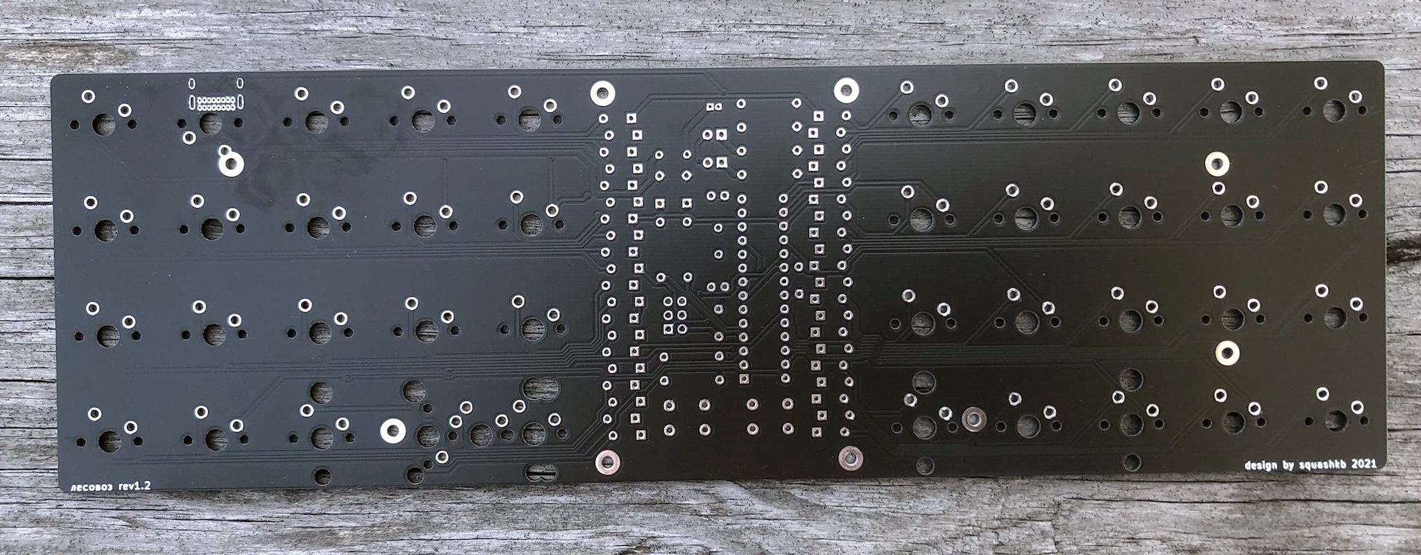 Back of a black rev1.2 Lesovoz PCB