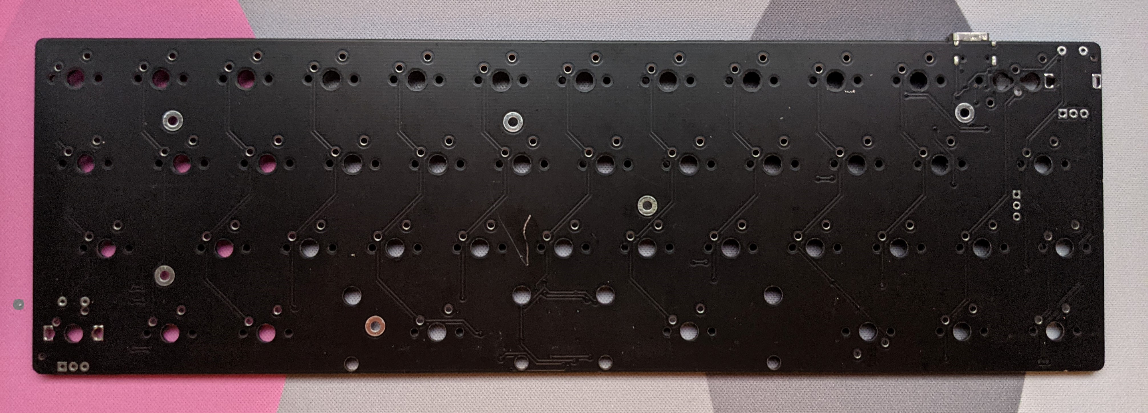 Front of a black m3n3van rev2 PCB