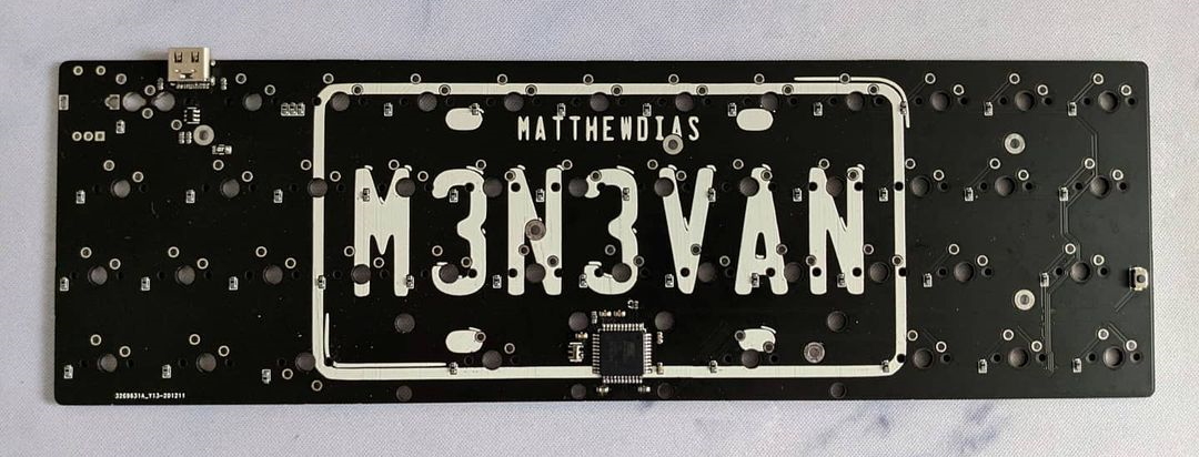 The back of an early prototype rev2 m3n3van PCB. Only a single rotary encoder was supported on the split backspace and the RGB header was absent