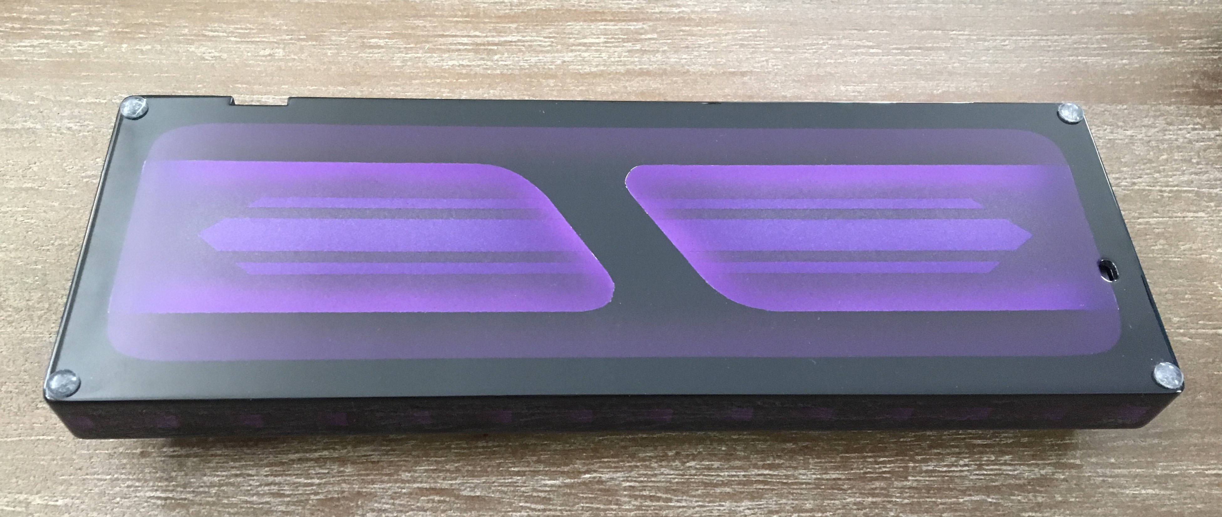 Bottom of the purple prototype ARTIZEN case