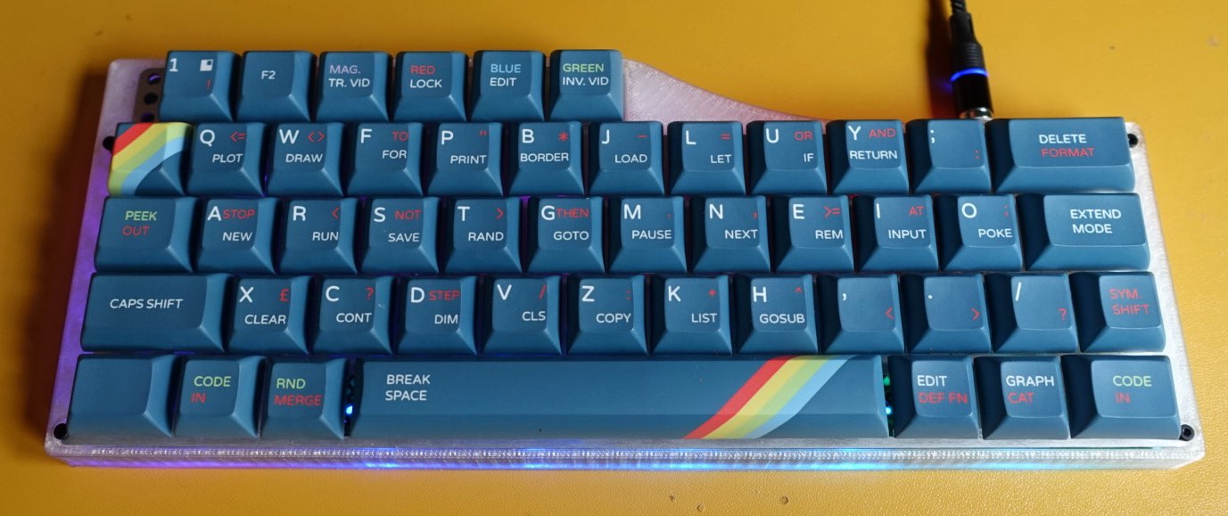 A clear 3D printed V4N² bottom with KAM Wrath keycaps. This board is using the right USB port found on Monorail PCBs.